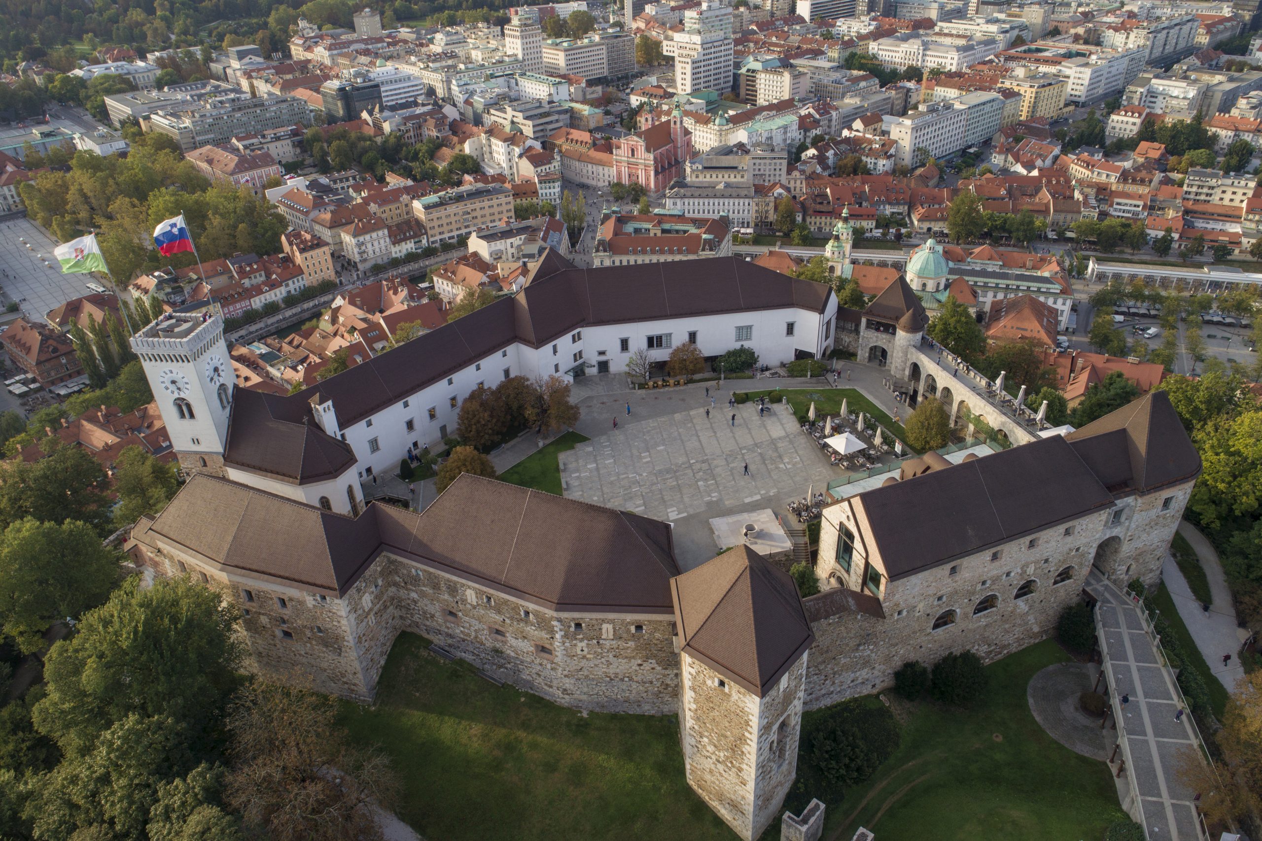 Airial vew of Ljubljana Castle and its courtyard with the city below.