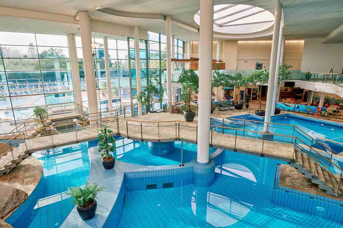 Interior of Atlantis water park in Ljubljana with pools and bridges